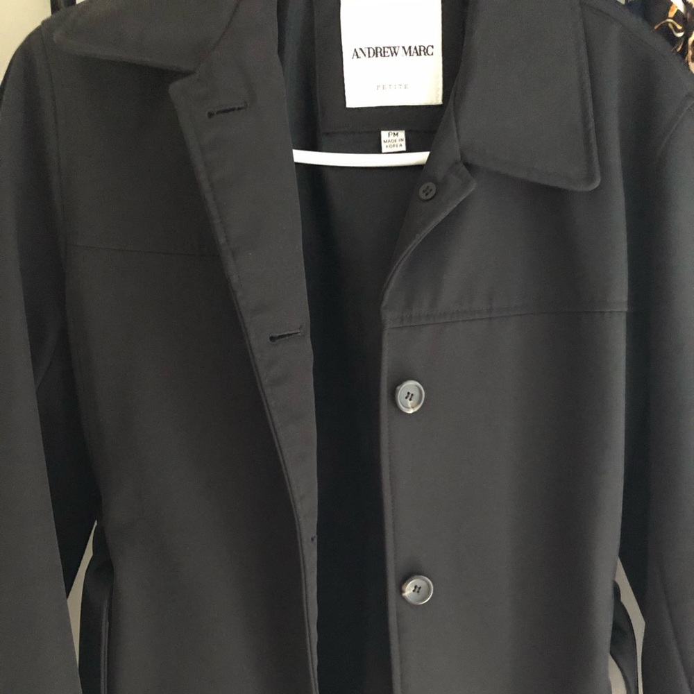 Women's black belted rain jacket